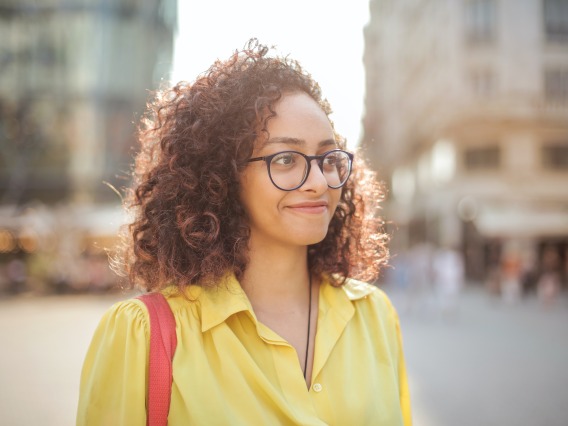 person wearing glasses smiling