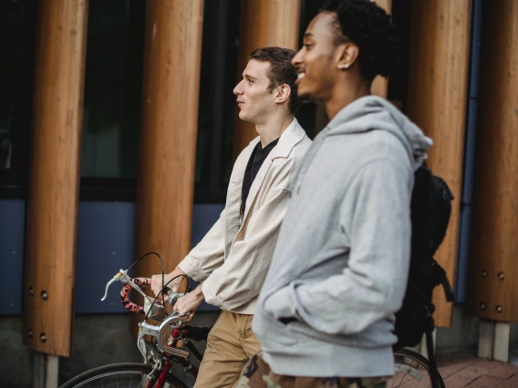 two people walking and talking