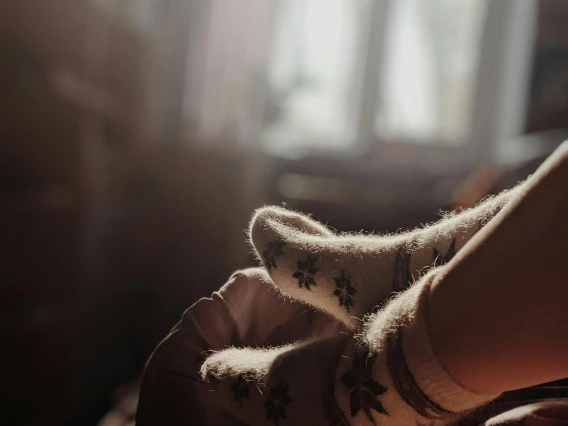 close-up image of a person pointing their toes