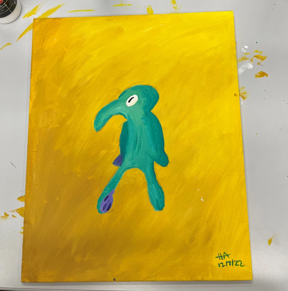 illustration of a green cartoon character on a yellow background