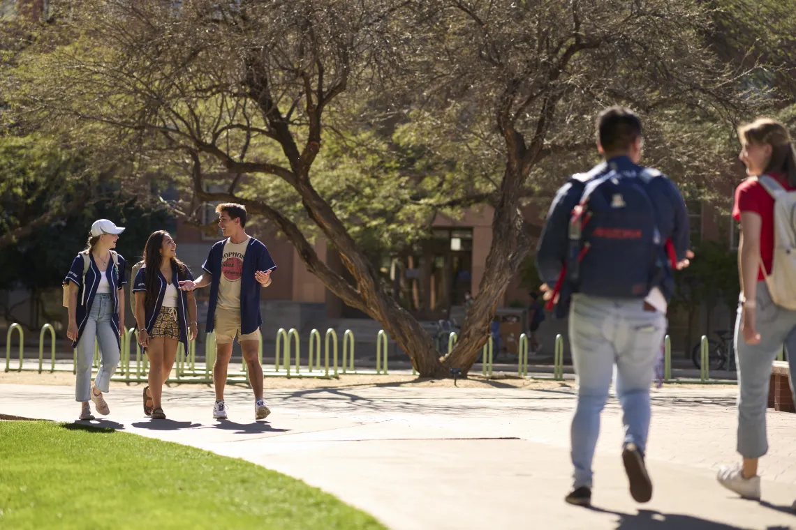 group of students walking on campus
