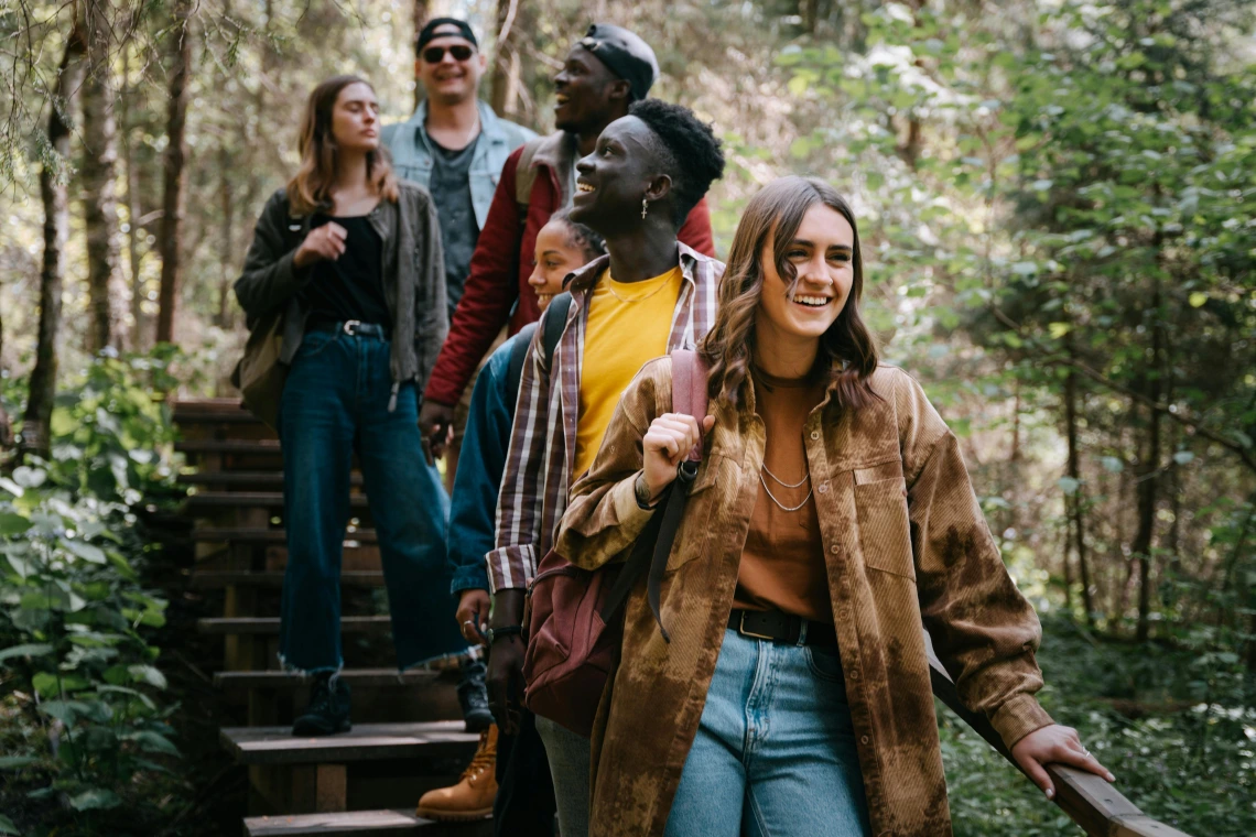 group of people walking down outdoor steps
