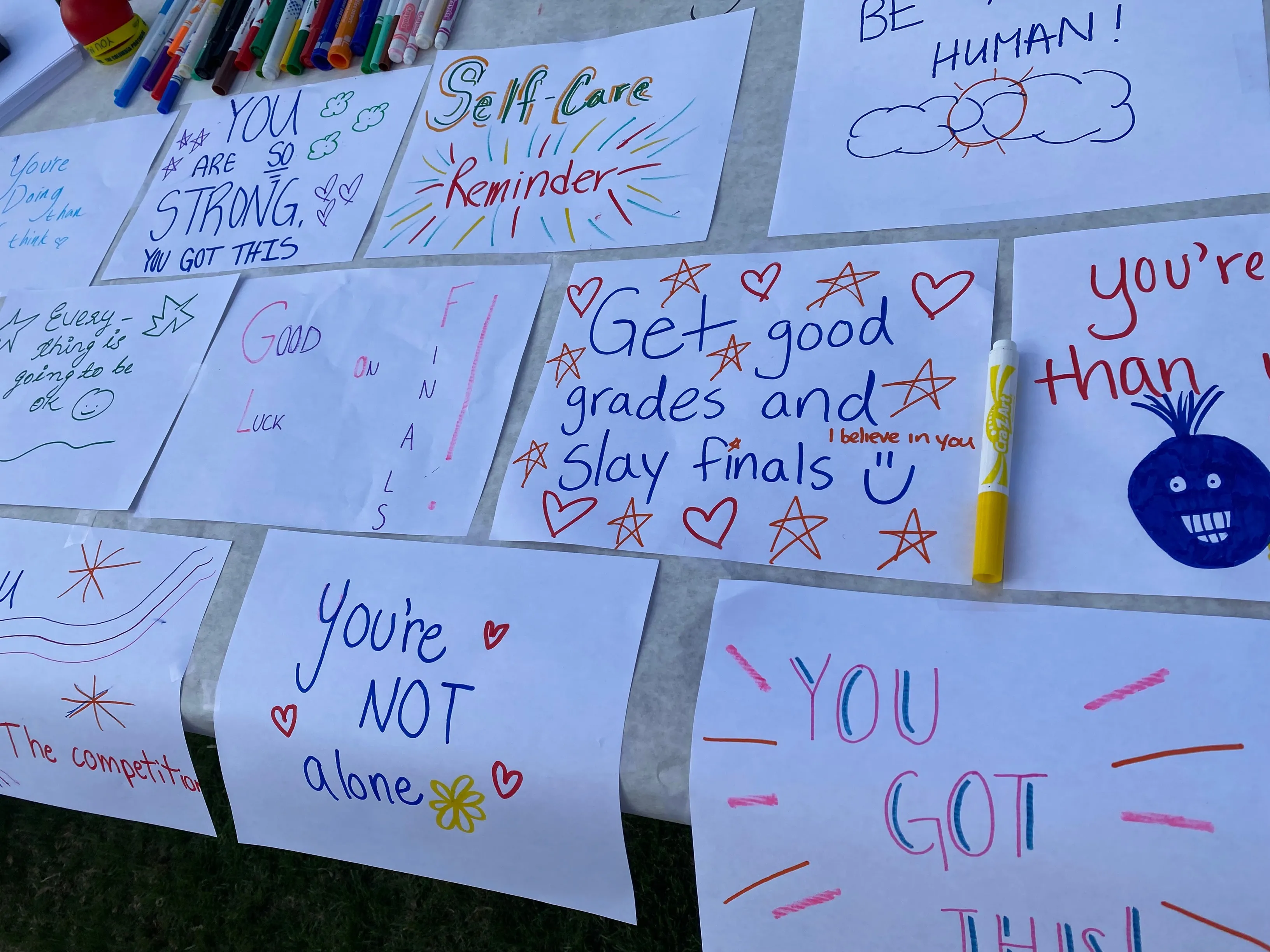 hand-written notes and pictures on a table